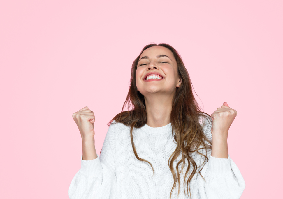 Excited woman celebrating success